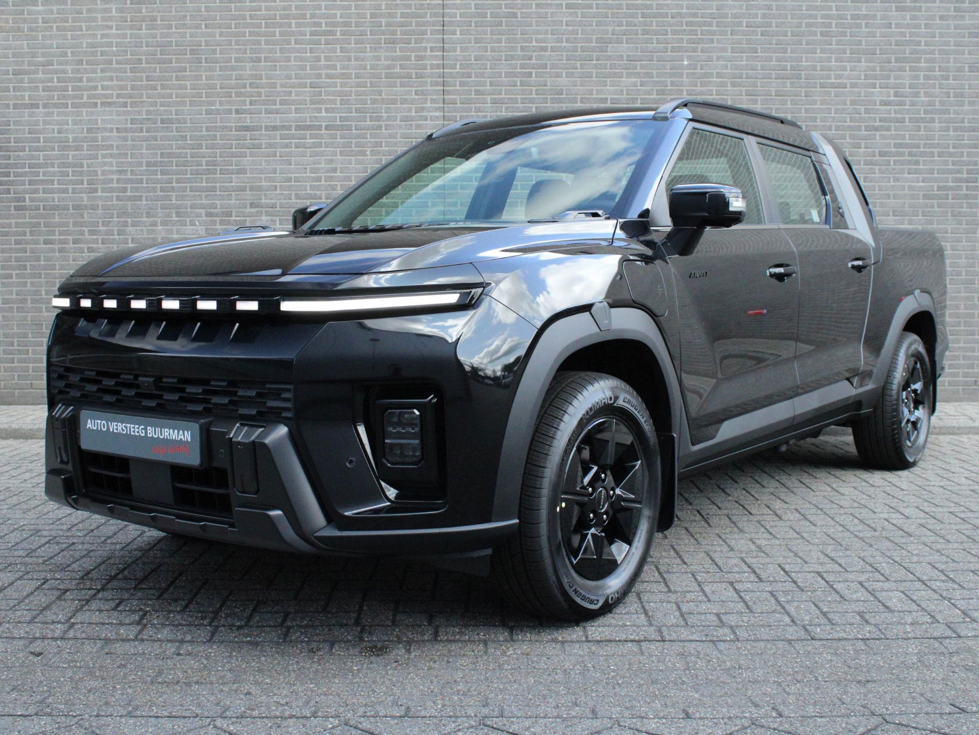 Foto van KGM Musso Ev