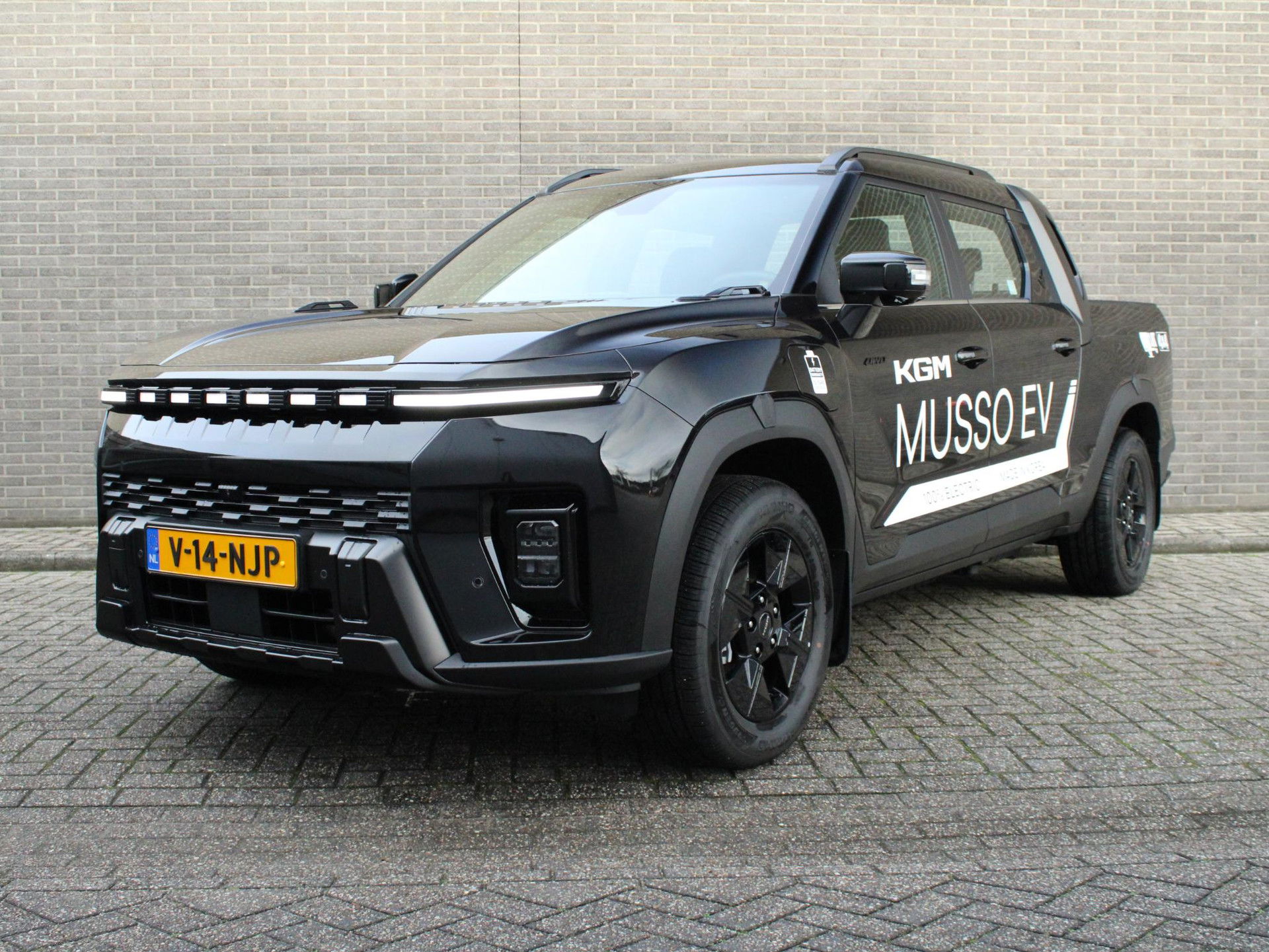 Foto van KGM Musso Ev