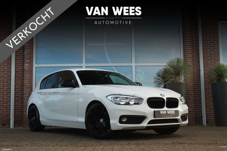 Foto van BMW 1-serie 116i F20 Essential Facelift 5-deurs | NL auto | Sportstuur | PDC | Navi | Cruise-control | NAP | Alpinweiss |
